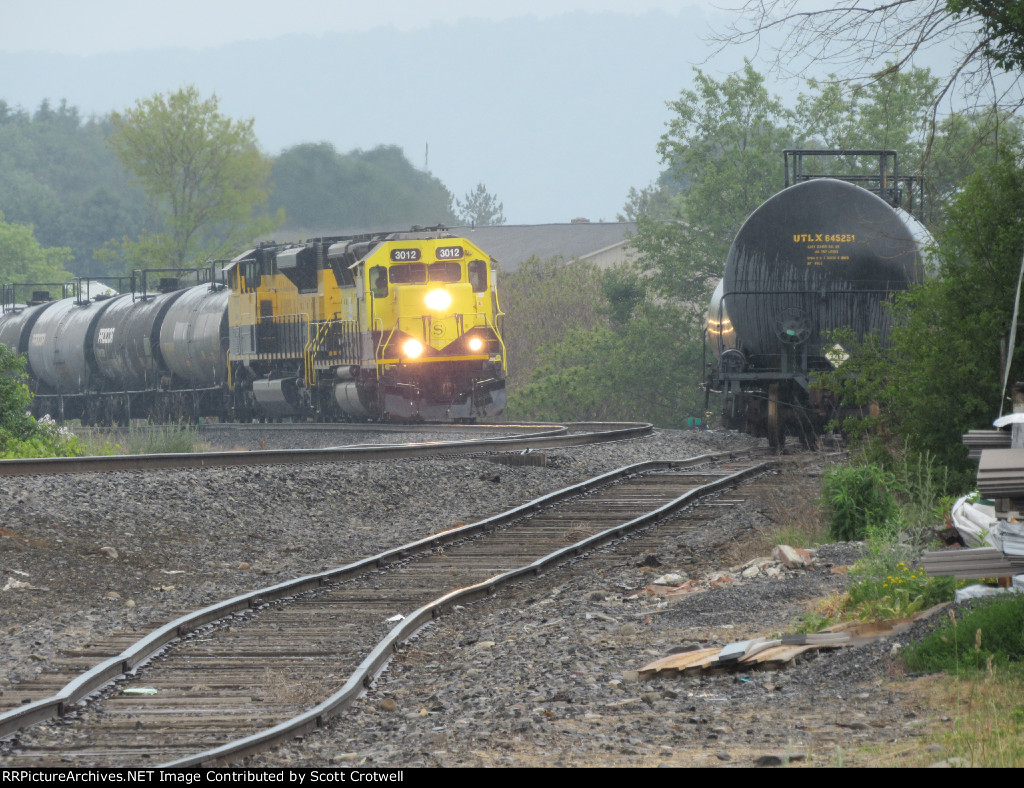 Easing toward the tank cars